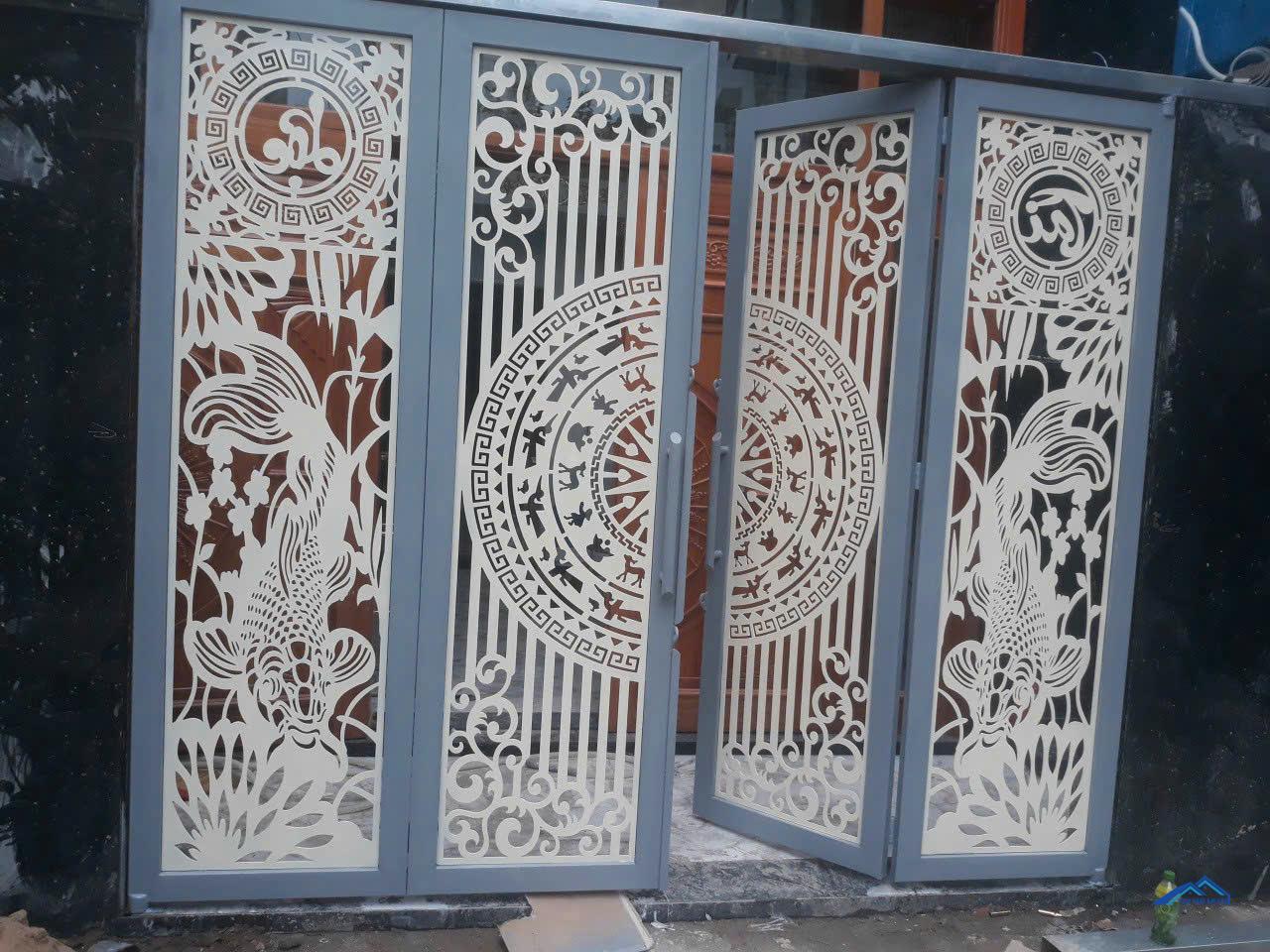 Mẫu cửa cổng 4 cánh CNC Đẹp Nhất Hiện Nay 3 mẫu cửa cổng cnc 4 cánh đẹp cá chép, trống đồng